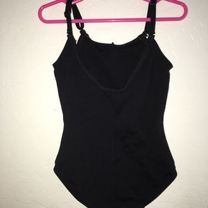 This is a black Capezio Leotard. Size Girls 12.